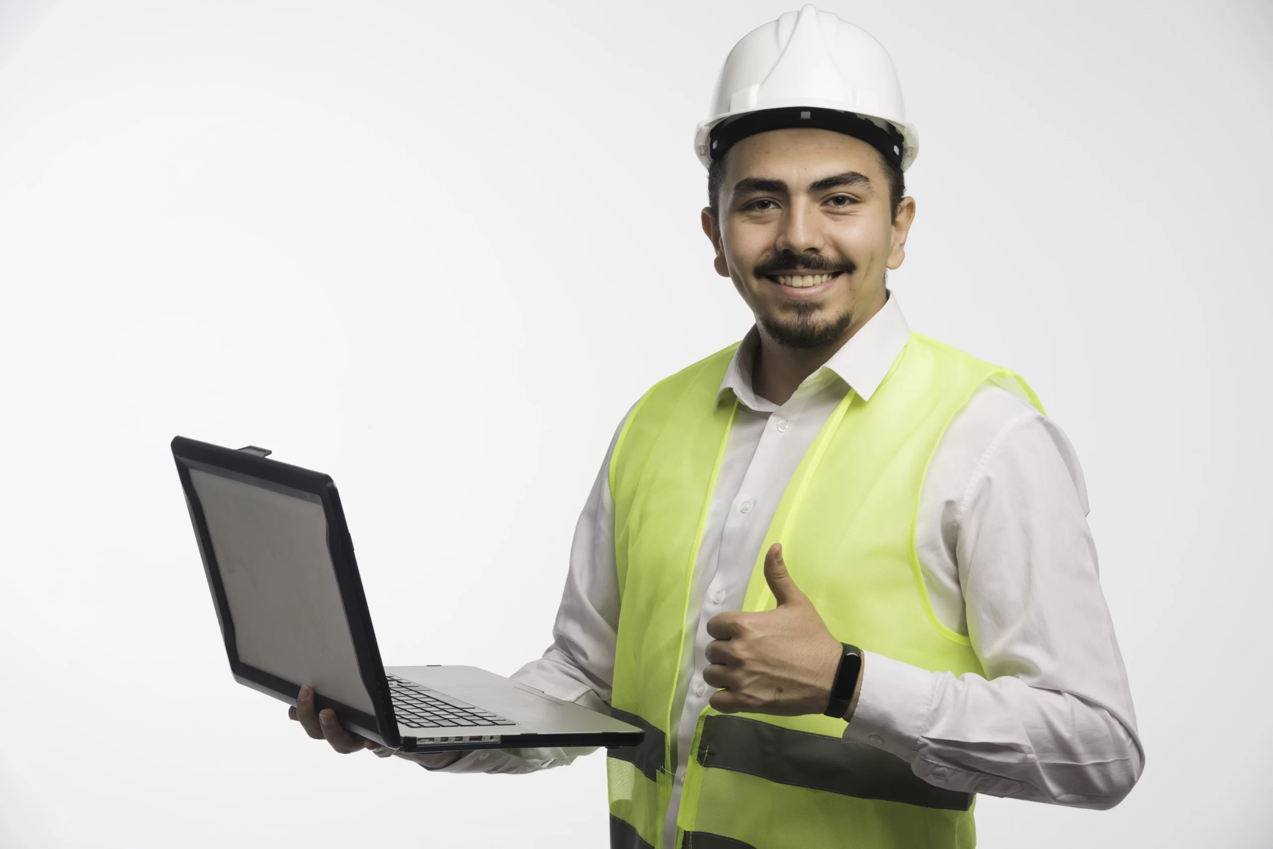 engineer-uniform-holding-laptop-making-thumb-up-min